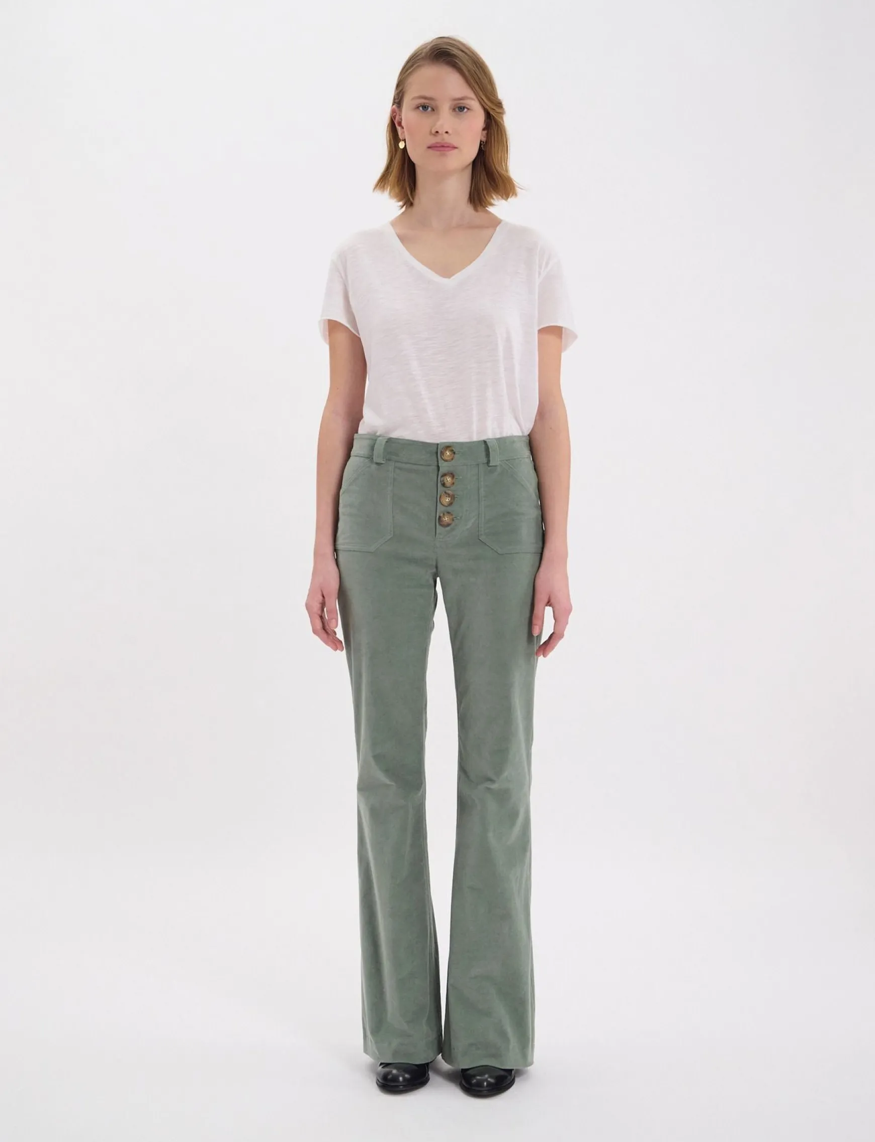 Charlotte trousers in almond green smooth velvet