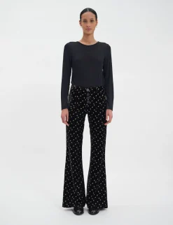 Charlotte trousers in smooth black velvet with gold print