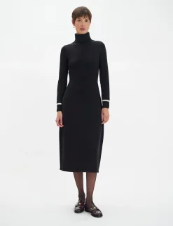 Divine black turtleneck dress with white trim