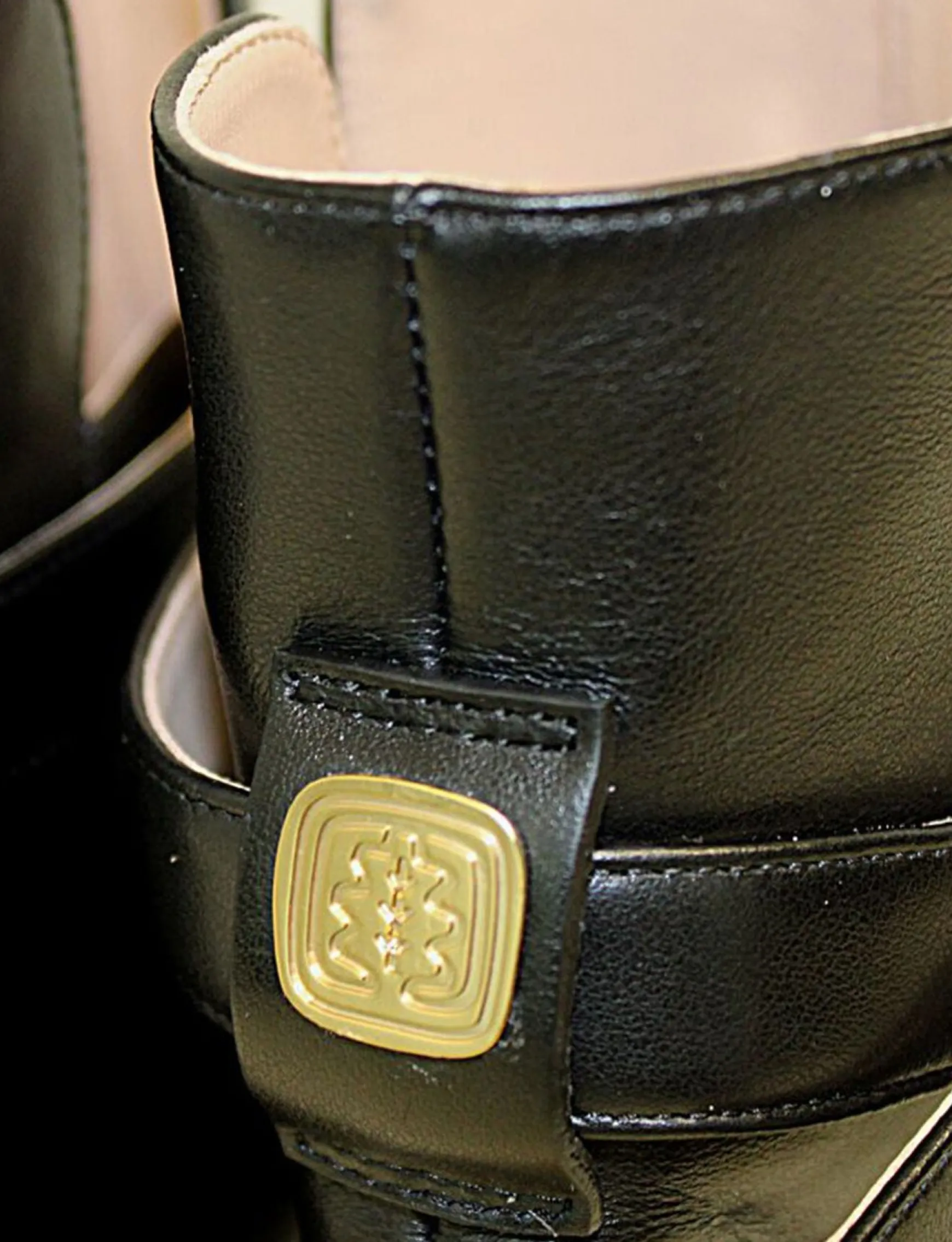 Flat black leather ankle boot