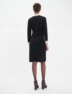Gabby dress in black merino wool, white cuffs
