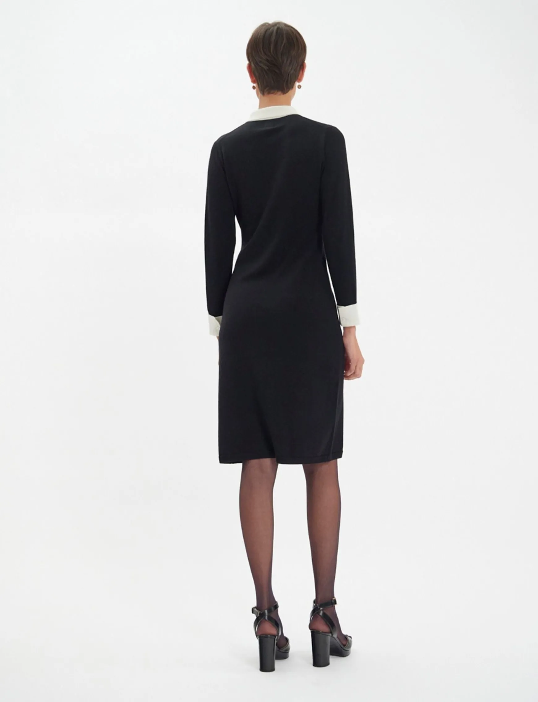 Gabby dress in black merino wool, white cuffs