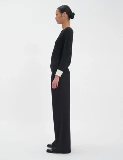 Gigi jumper in black merino wool, white cuffs