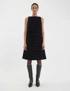 Madeleine dress in smooth black velvet with gold print