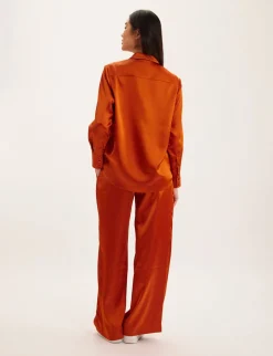 Maureen burnt orange shirt